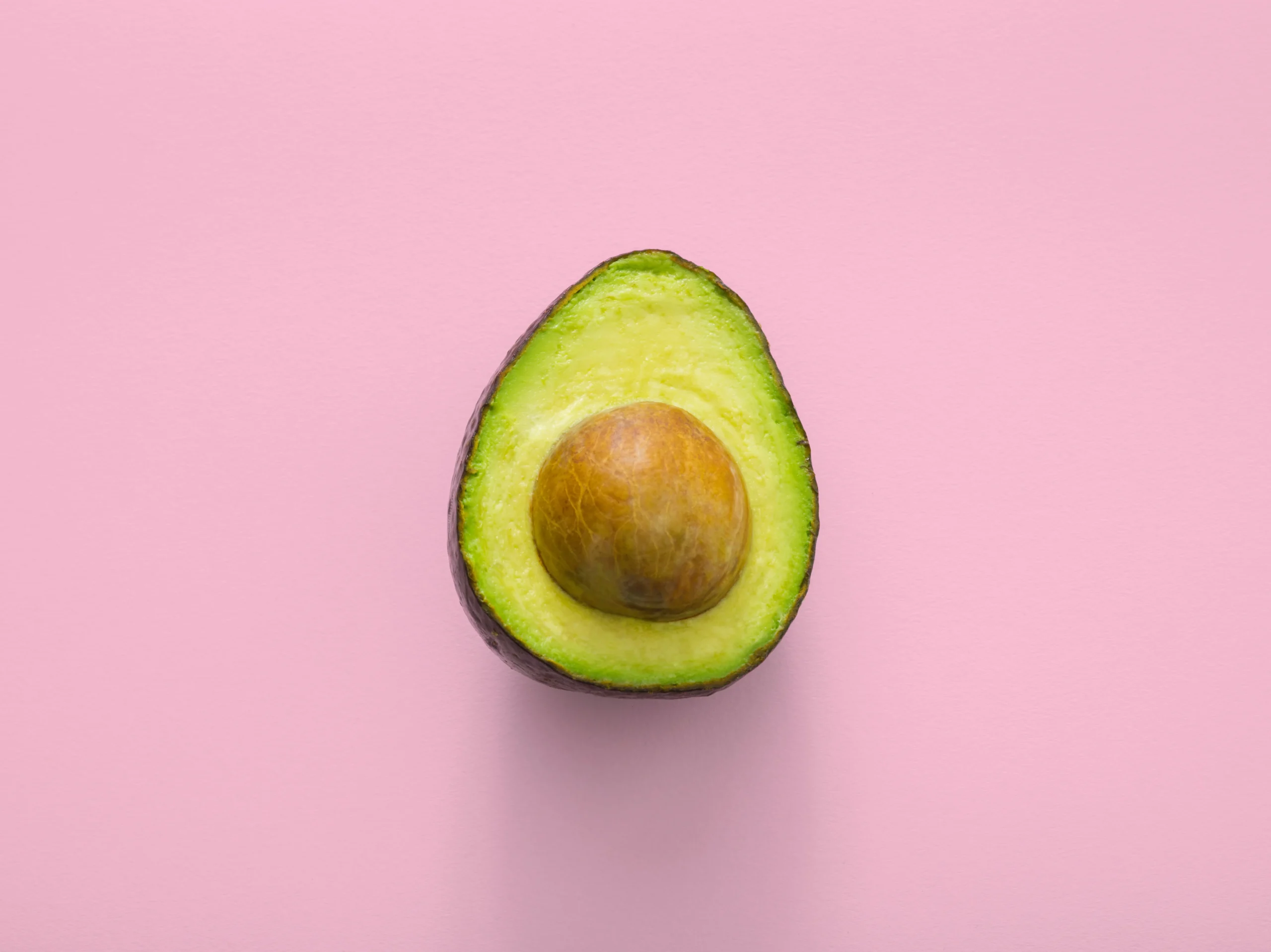 Avocado on a pink background